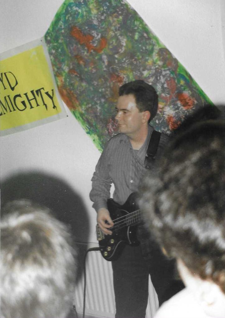 Andrew "Dougie" Douglas playing bass for Lloyd Almighty at a house party in Old Trafford